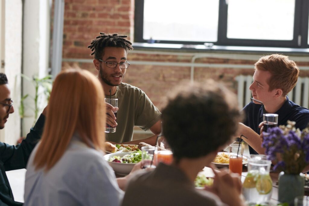 A group of friends enjoying a savoury lunch in a restaurant