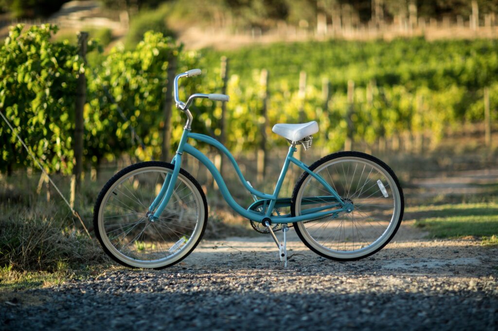 A bicycle on a field - sports equipment transported by a Man and Van