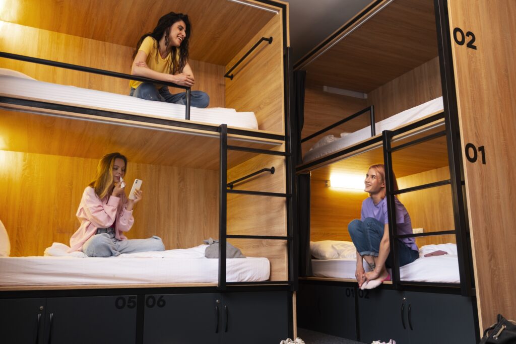 Female students inside their dormitory room after moving